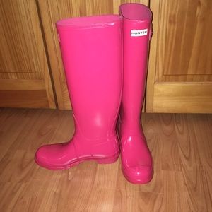 Tall pink Hunter boots